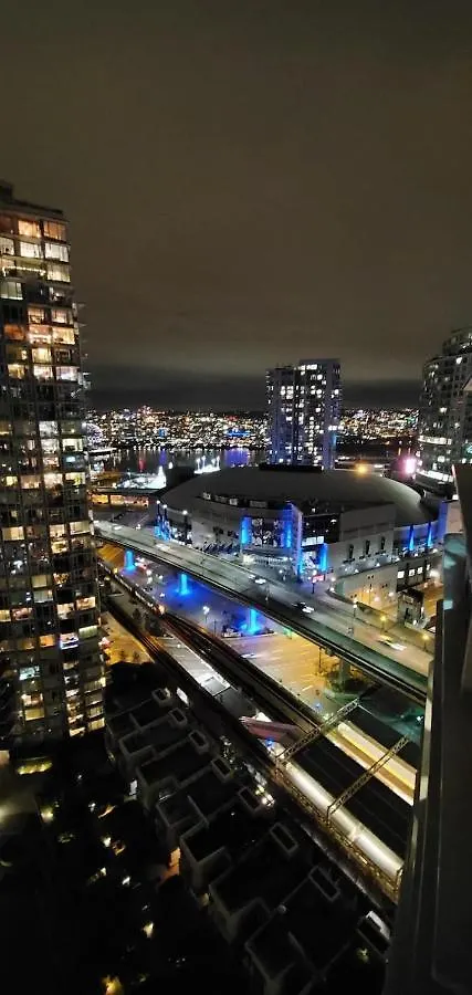 Downtown Water View Condo: Modern 2BR with AC and Parking Vancouver Canada